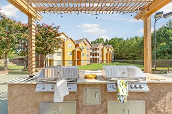Outdoor kitchen with grilling station